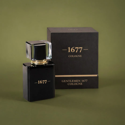 Black and gold cologne bottle featuring '1677' on the front next to a black and gold box with the words '1677 COLOGNE' and 'GENTLEMAN 1677 COLOGNE' on it against an olive green background