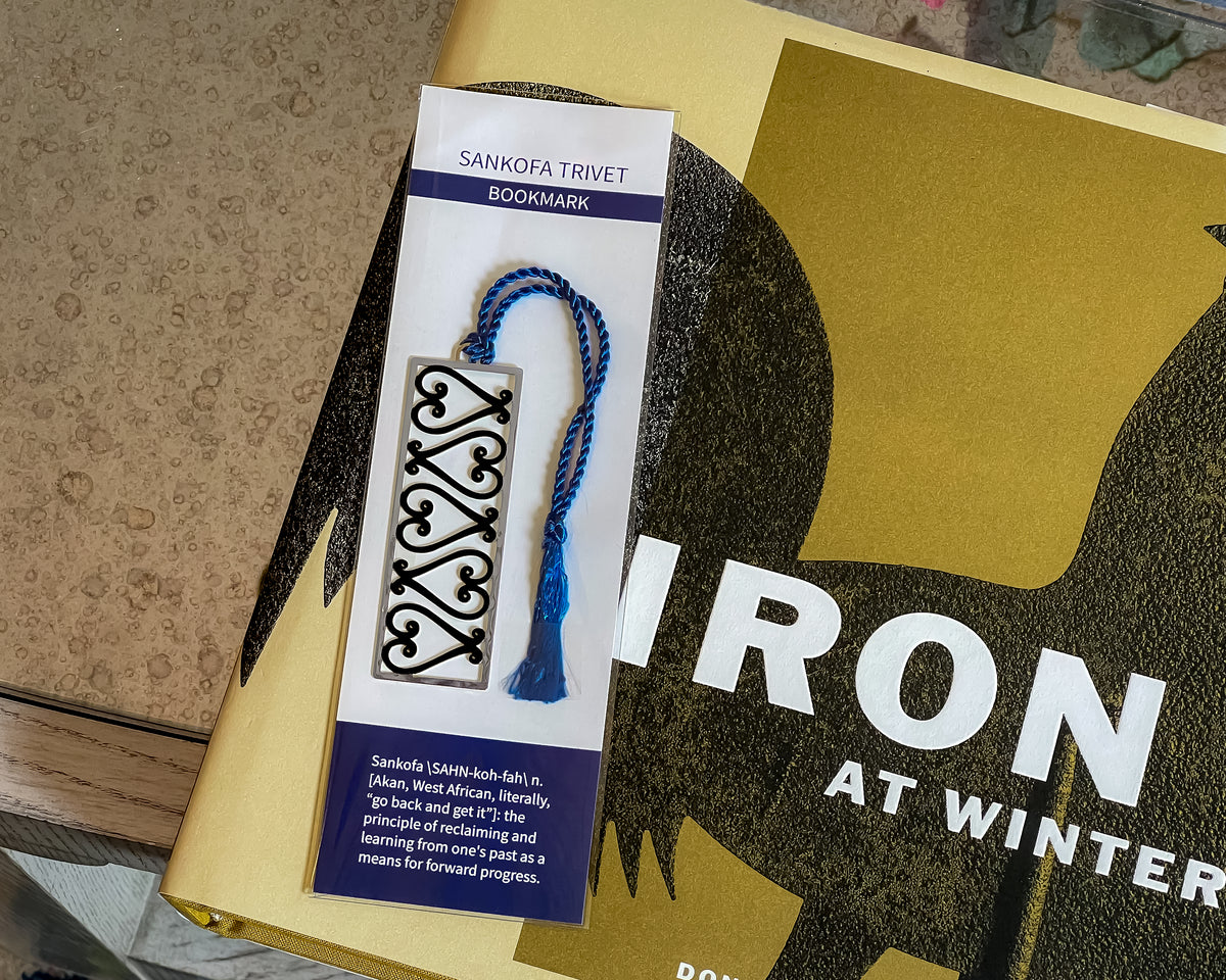 Bookmark with decorative design on a book titled 'Iron at Winter'.