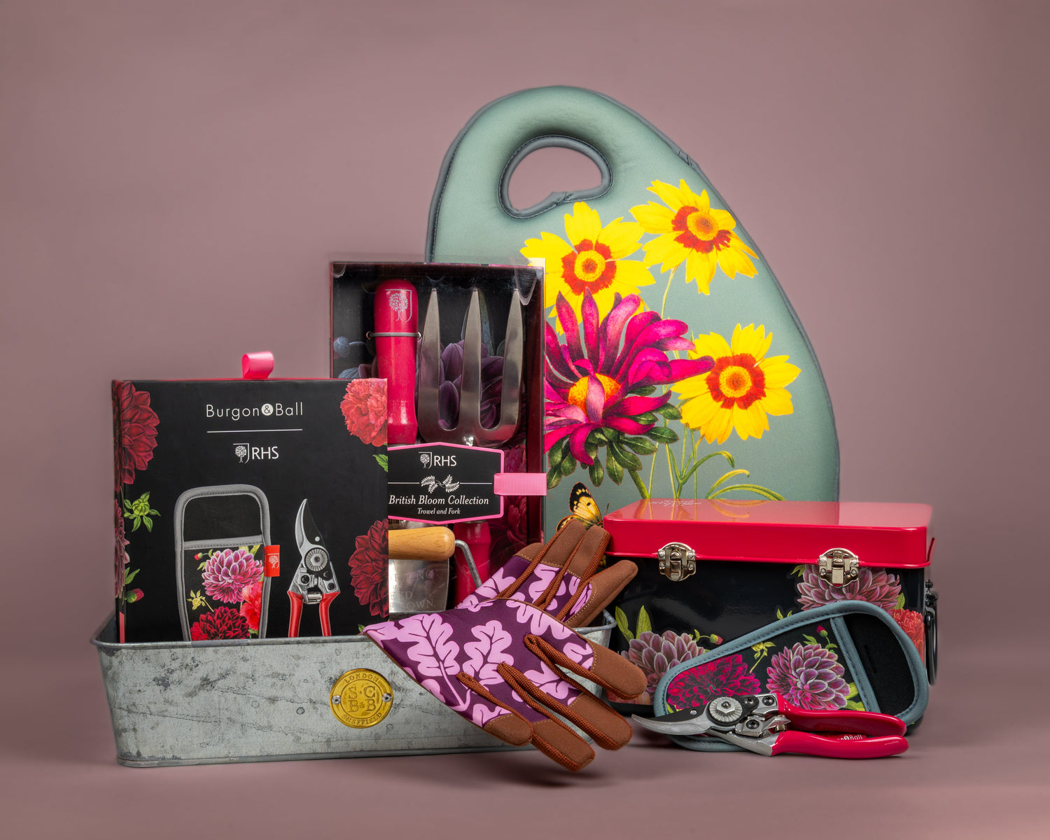 A collection of floral patterned gardening tools and accessories.