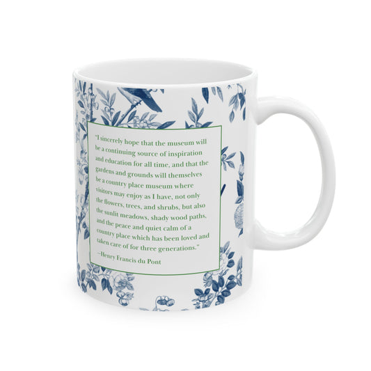 Mug with floral design and text on a white background
