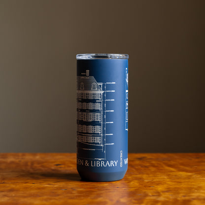 Blue tumbler featuring an architectural sketch and the words "Winterthur Museum, Garden & Library"  under design on a wooden tabletop and dark background