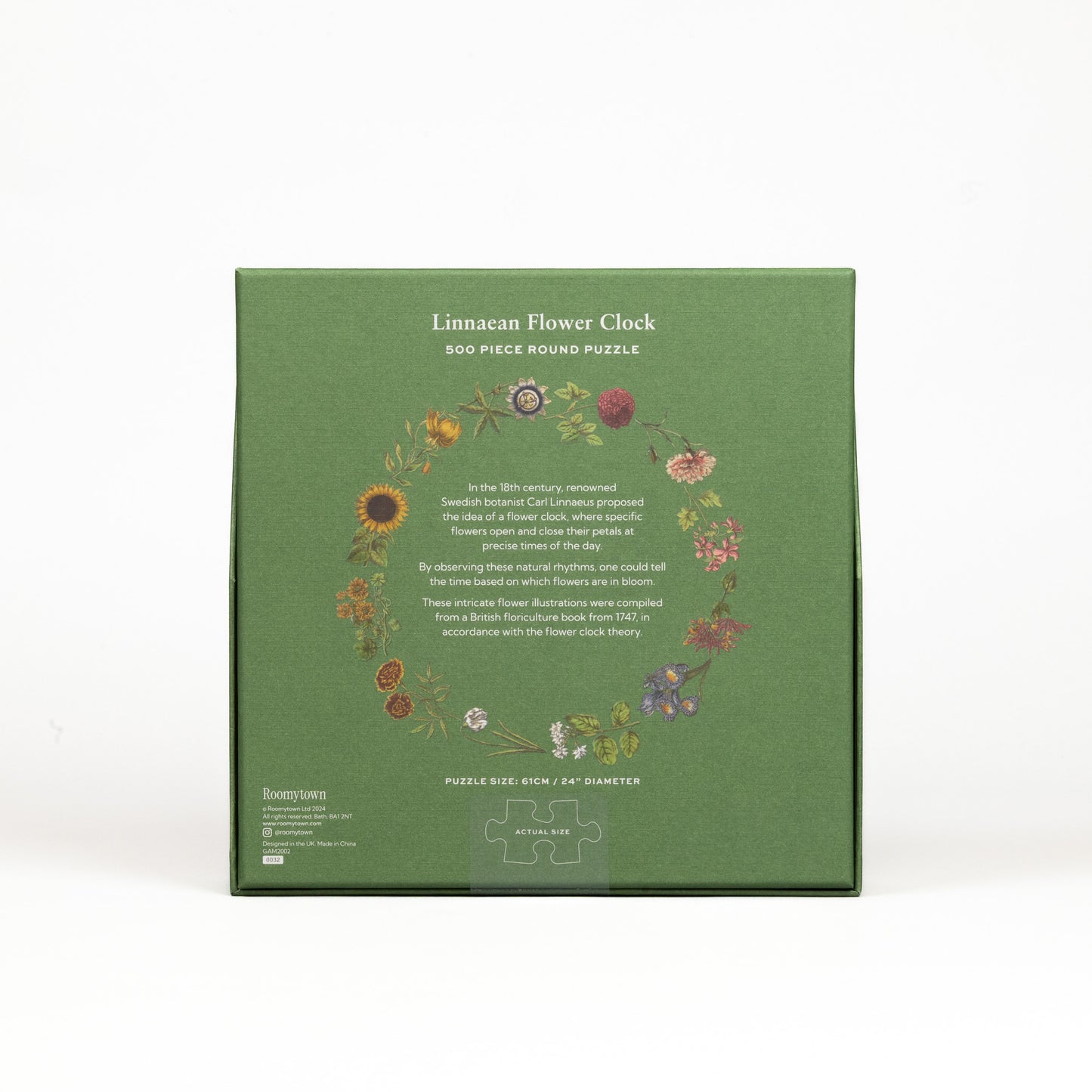 Green box of a 500-piece round puzzle titled 'Linnaean Flower Clock' on a white background