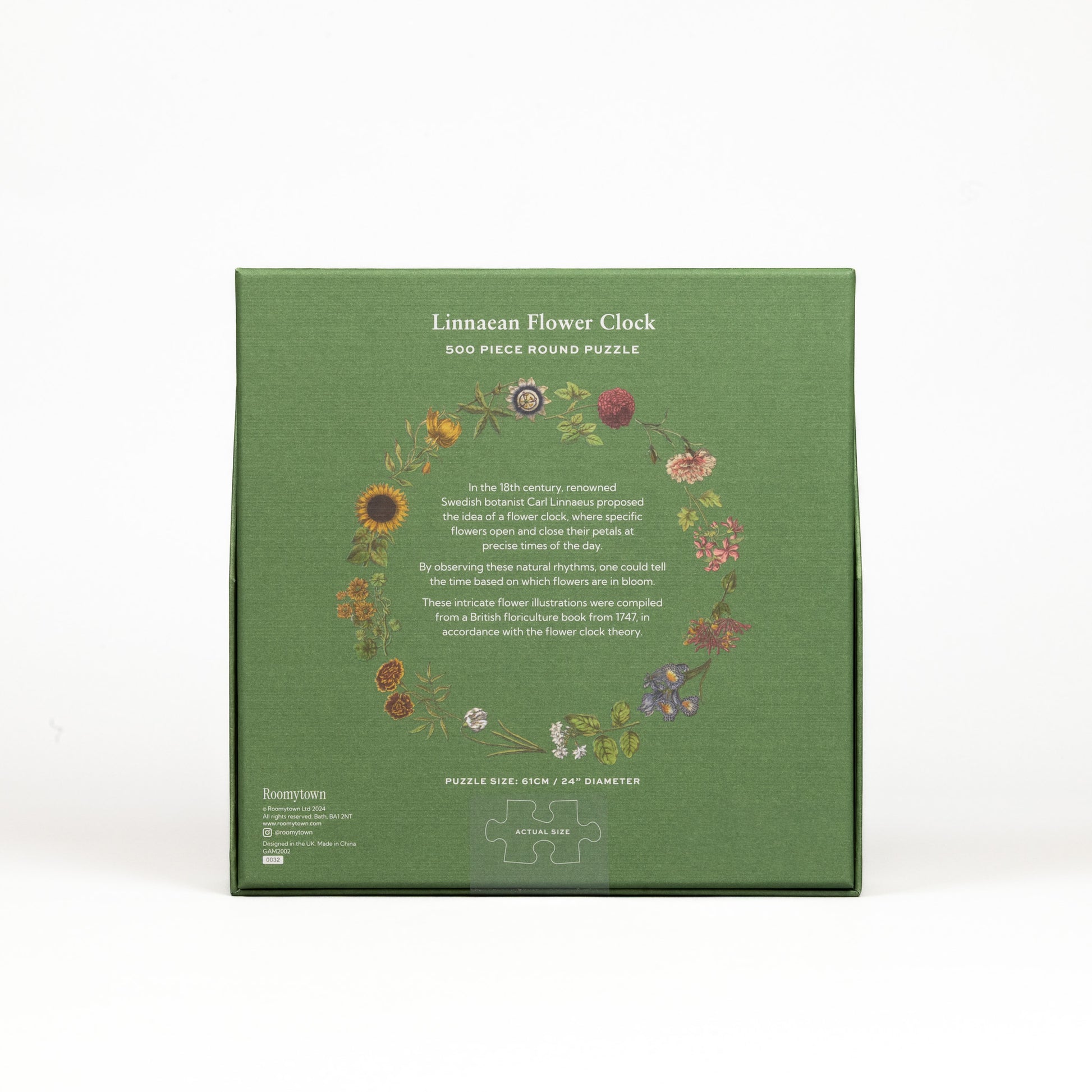 Green box of a 500-piece round puzzle titled 'Linnaean Flower Clock' on a white background