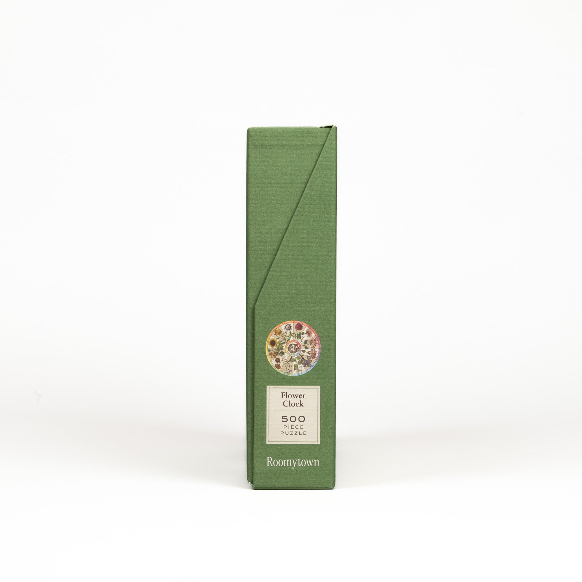 Side of a 'Flower Clock' jigsaw puzzle box with a circular design on a white background