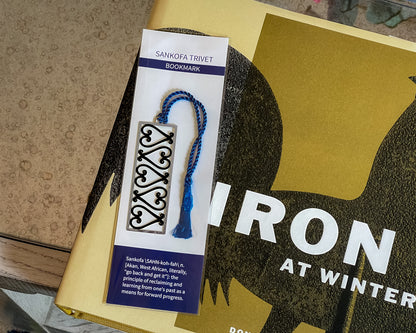 Bookmark with decorative design on a book titled 'Iron at Winter'.