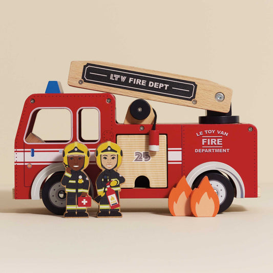 Wooden toy fire truck set with firefighters and flames on a beige background