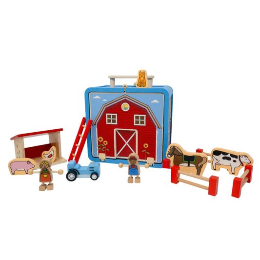 Toy farm set with a red barn, animals, and figures on a white background