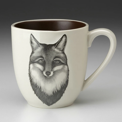 An off-white stoneware tapered mug featuring a sketch of fox portrait in black and a dark brown interior.