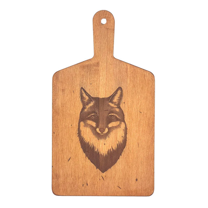Wooden cutting board with a fox engraving on a white background