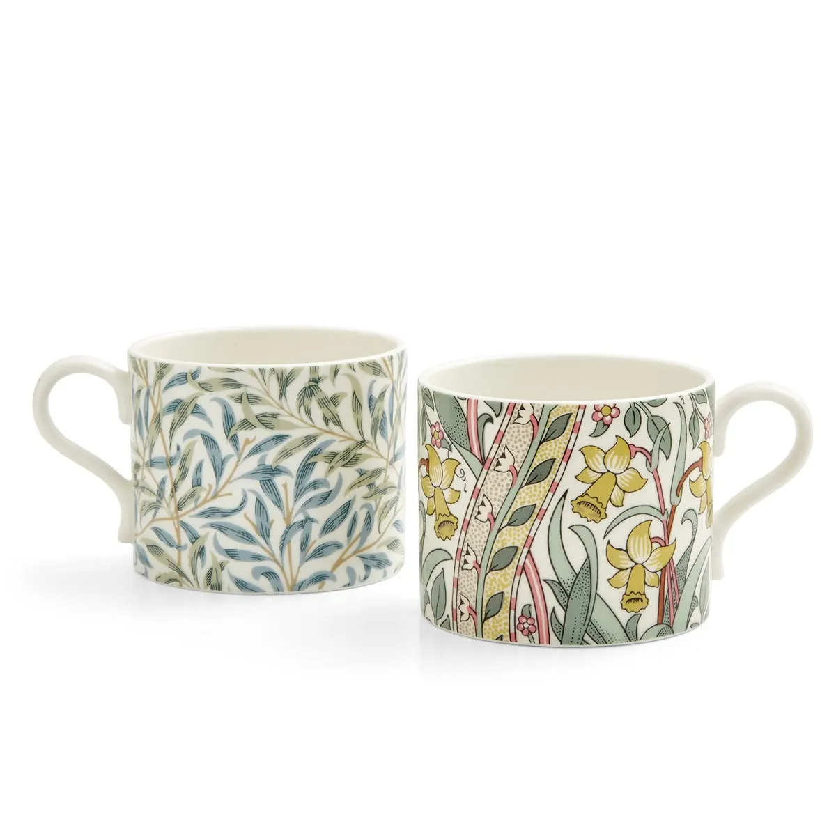 Two ceramic mugs with floral patterns on a white background