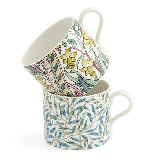 Two floral-patterned mugs stacked on a white background