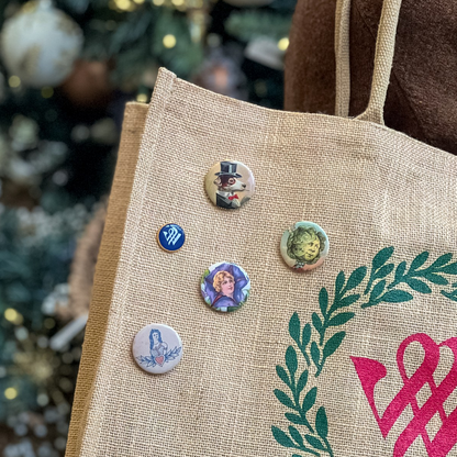 Winterthur pins attached to a branded jute tote bag.
