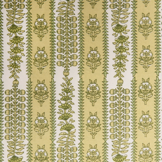 Block printed floral pattern in green and yellow on cotton