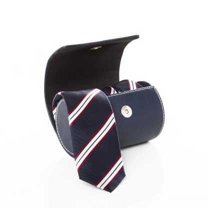 Navy blue faux-leather open tie case with a striped necktie inside against a white background