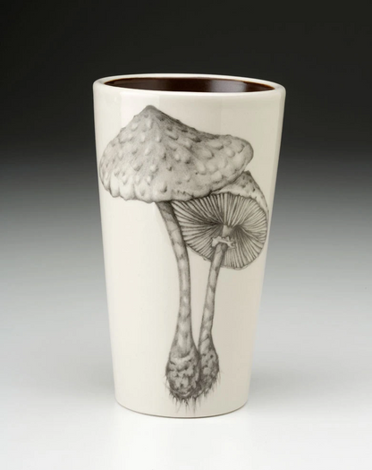 An off-white stoneware tapered travel mug featuring a sketch of two mushrooms in black.