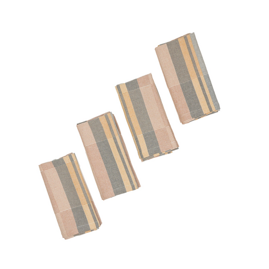 Four rectangular woven fabric napkins with vertical stripes in off-white, yellow, gray, and muted orange, arranged diagonally on a plain white background.