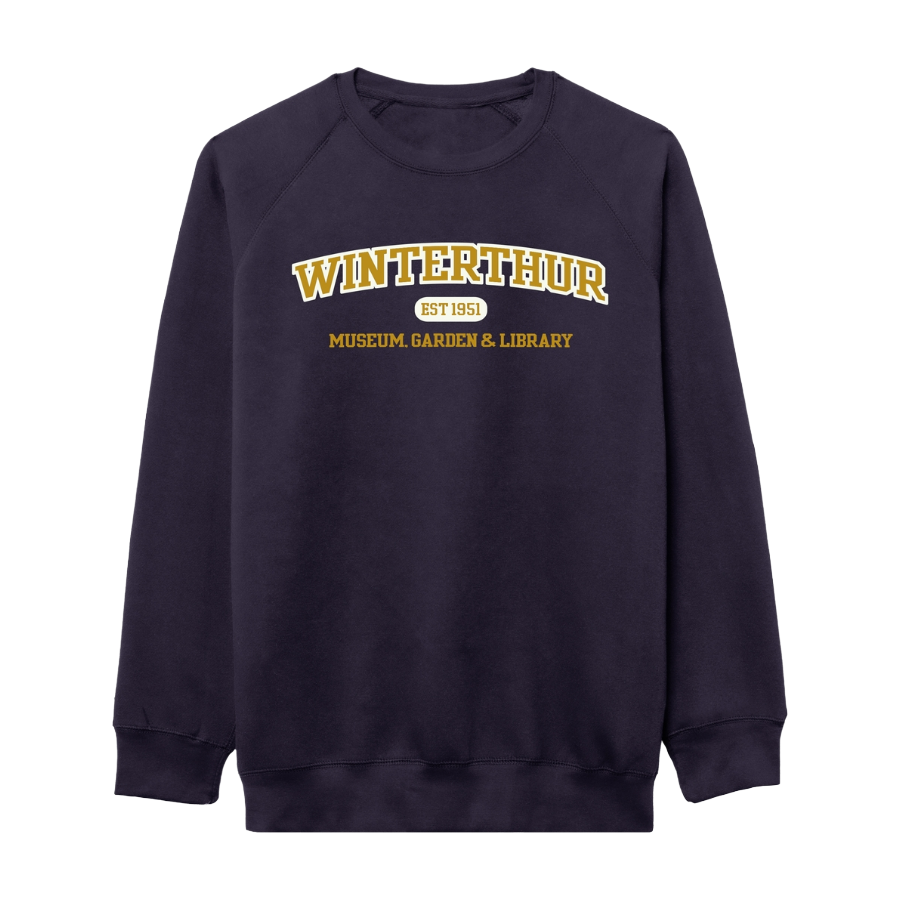 Navy blue crewneck sweatshirt with the words 'WINTERTHUR EST 1951 MUSEUM, GARDEN & LIBRARY' embroidered in gold and white across the chest 
