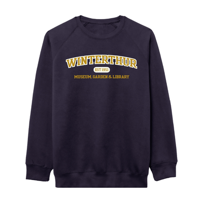 Navy blue crewneck sweatshirt with the words 'WINTERTHUR EST 1951 MUSEUM, GARDEN & LIBRARY' embroidered in gold and white across the chest 
